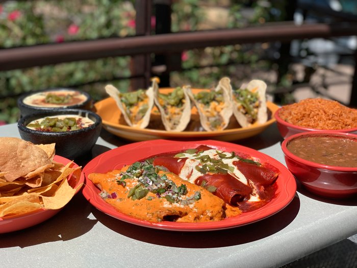 Best Mexican Food Delivery Scottsdale AZ, Best Mexican Food Delivery in Scottsdale AZ, Jalapeno Inferno Mexican restaurant in Scottsdale and Peoria Arizona showing plates of enchiladas and tacos with mexican sides